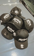 Richest Runner Trucker Hat